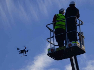 the drone flies over the site
